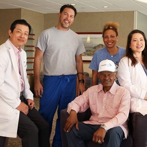 Manny Mota with care team